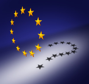 Europe questions or Eurozone crisis concept as a group of three dimensional stars creating a cast shadow of a question mark as a symbol for euro decision uncertainty on financial debt and social issues.