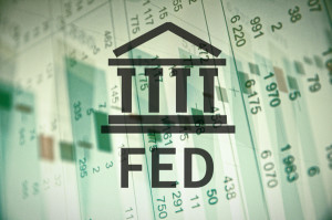 Building icon with inscription "Fed". Financial data on computer screen. Multiple exposure