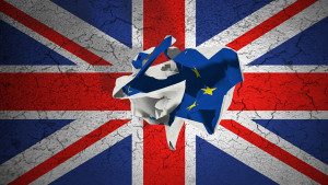 brexit rolling crumpled paper with blue european union EU flag on grunge great britain uk flag vote referendum for united kingdom exit concept