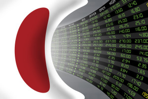 Flag of Japan with a large display of daily stock market price and quotations during economic booming period. The fate and mystery of Japan stock market tunnel/corridor concept.