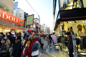 Tokyo Japan - November 24 2013: Crowd at Takeshita street Harajuku on November 24 2013 in Tokyo Japan. Takeshita street is a street lined with fashion cafes and restaurants in Harajuku.
