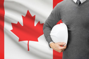 Architect with flag on background - Canada
