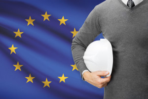 Architect with flag on background - European Union