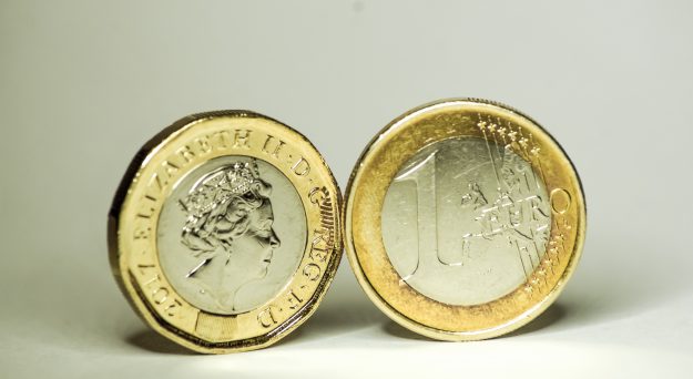 Euro edges lower after soft German data