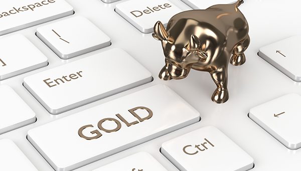 Risk aversion sends gold higher, oil downwards