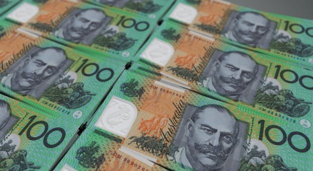 Australian dollar pares gains after strong wage growth